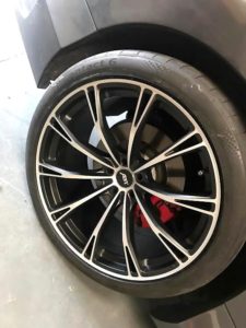 Repaired dented alloy wheel after